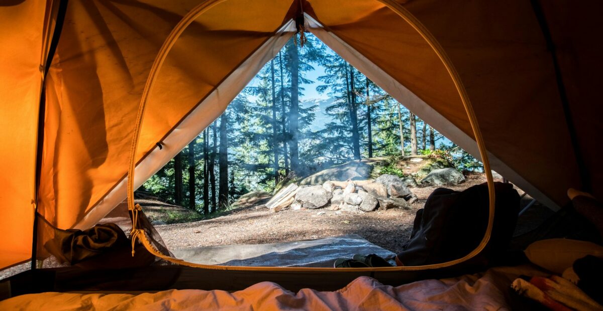 Safari tent at dusk in a private camp